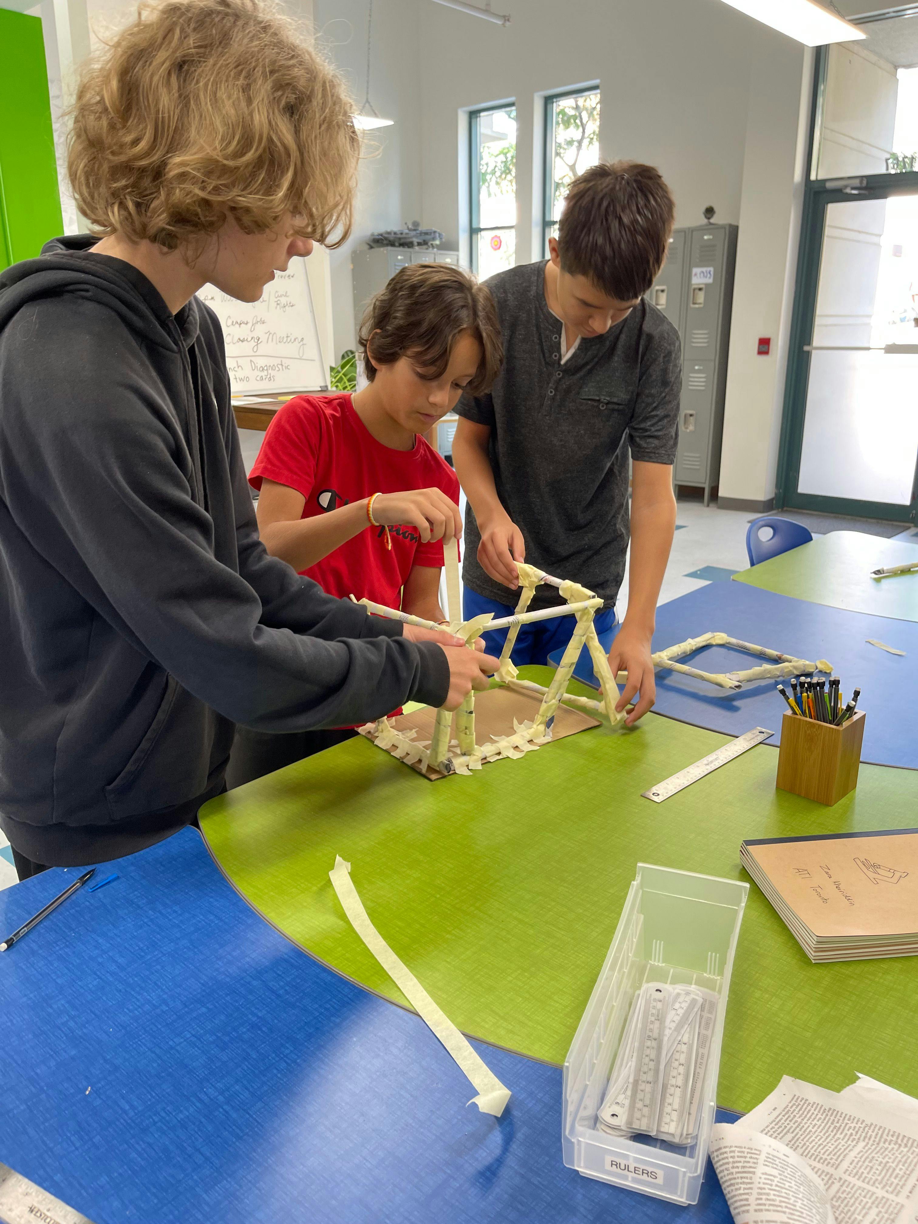 two ati toronto students working on a physics problem